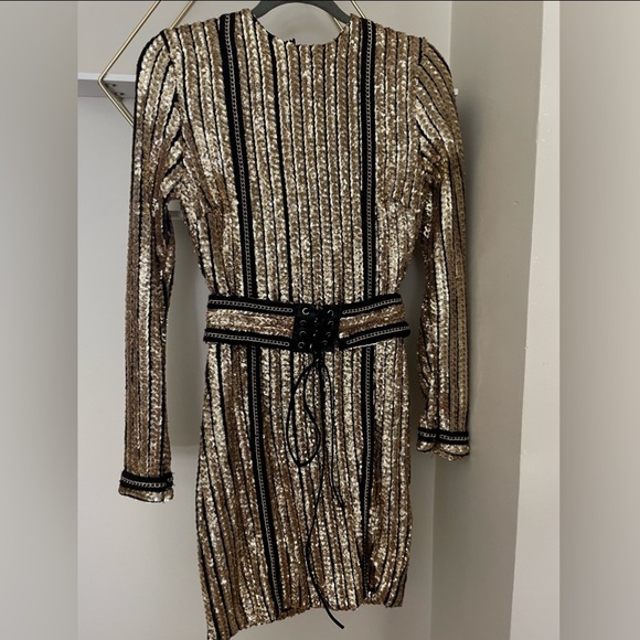 Dresses & Skirts - Black and gold long sleeve sequins dress